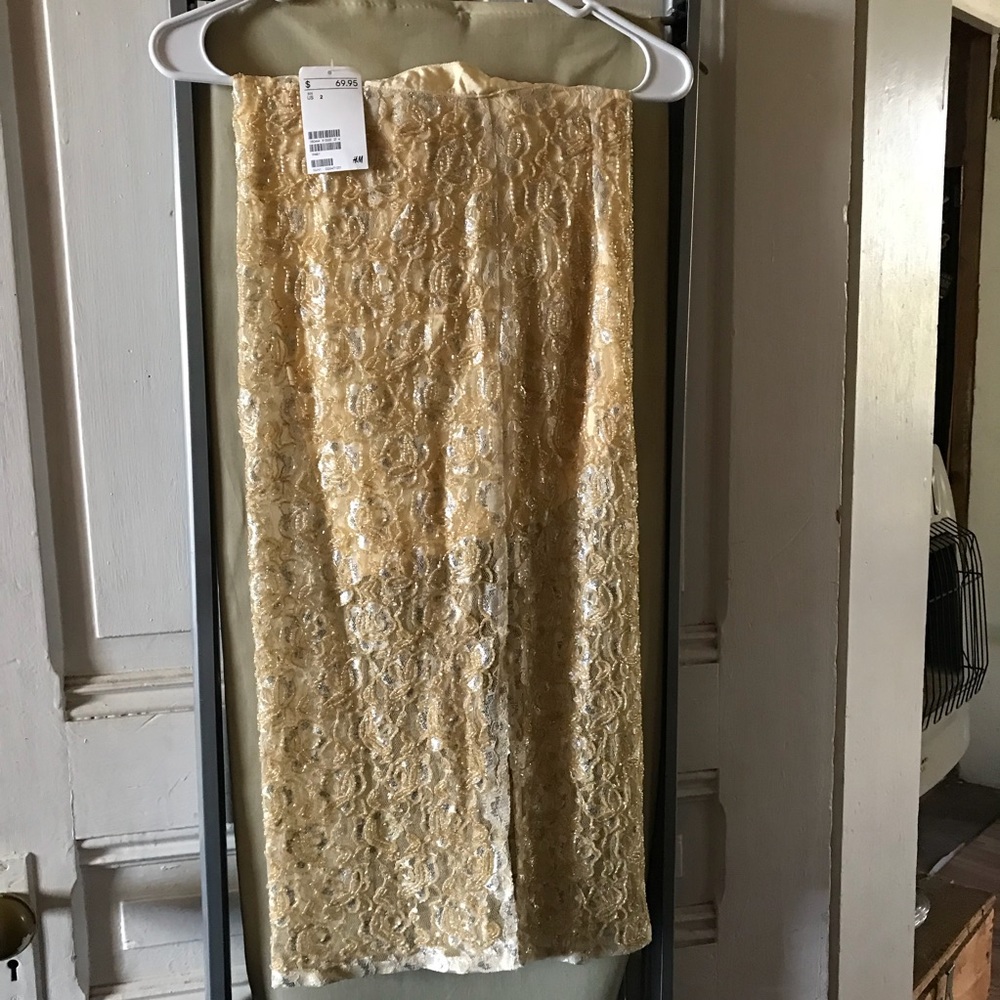 New with tags H&M Golden yellow beaded skirt.